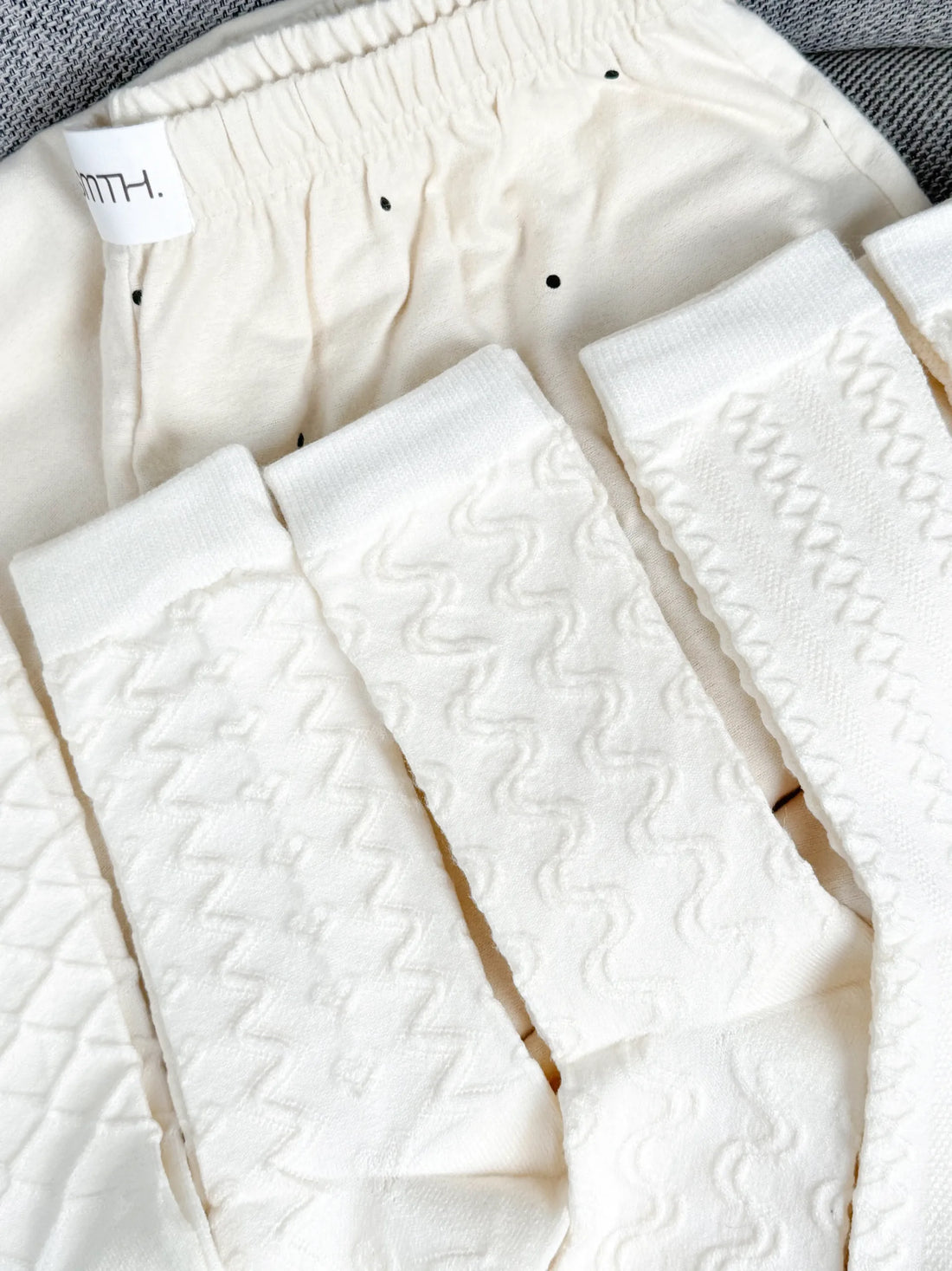 Set of white cashmere socks with patterns